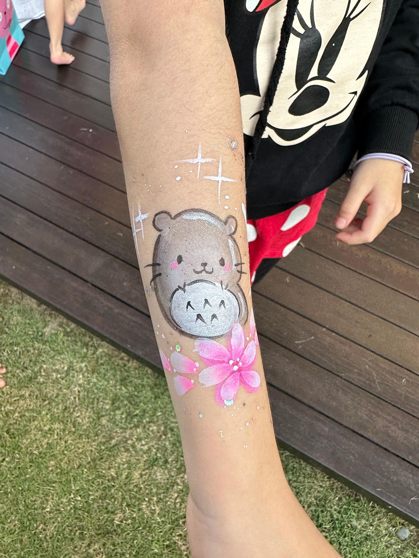 Face painting on a child's arm