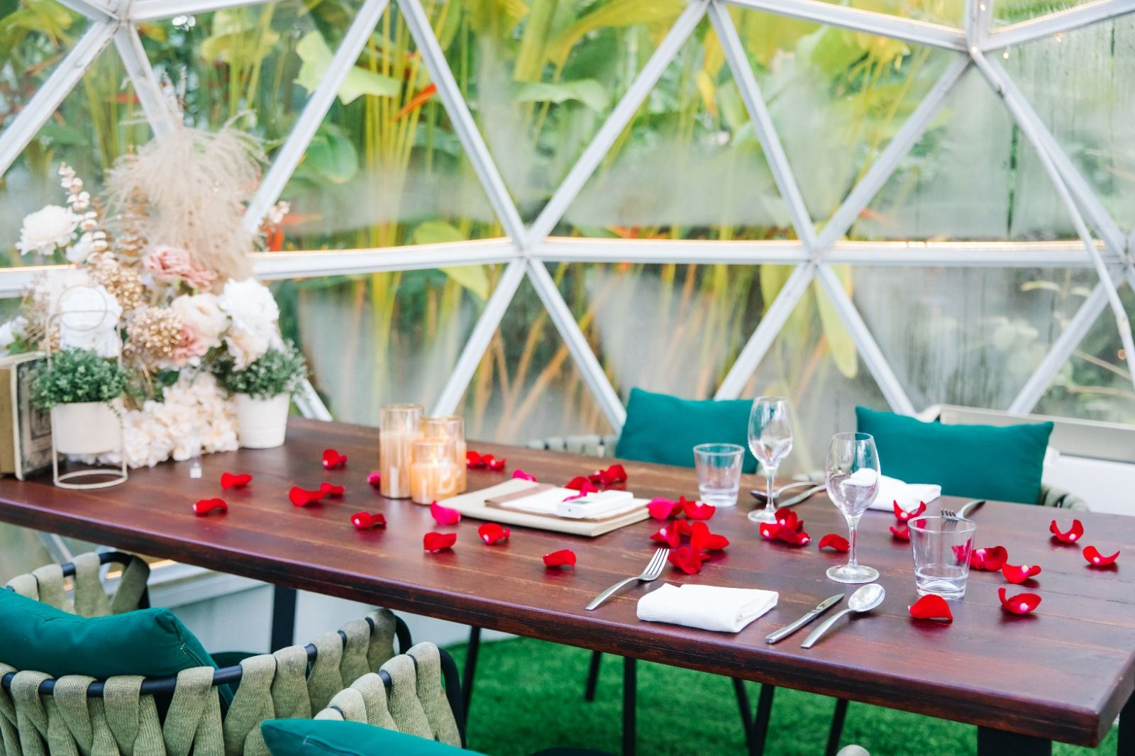 Dinner table inside a garden dome