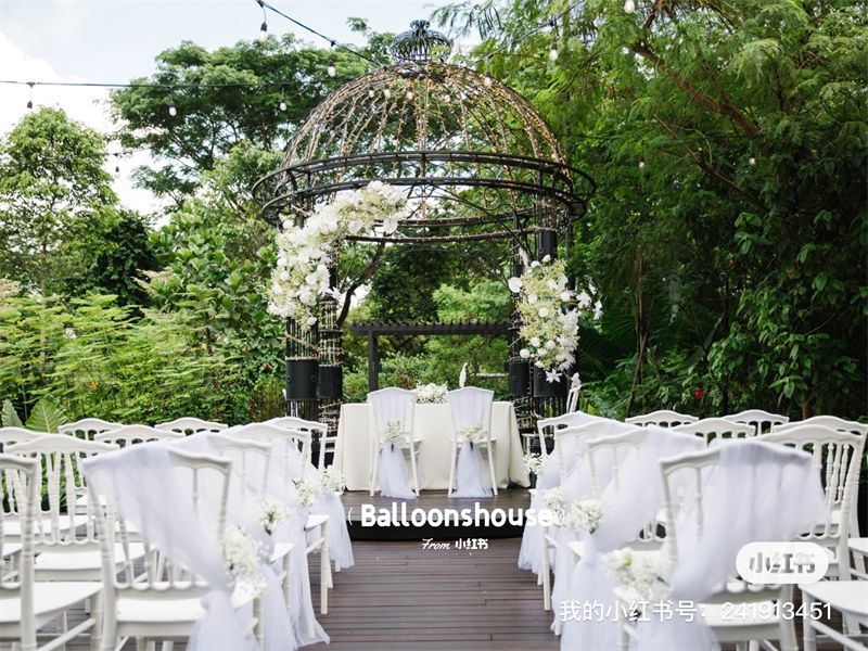Garden wedding aisle under a gazebo