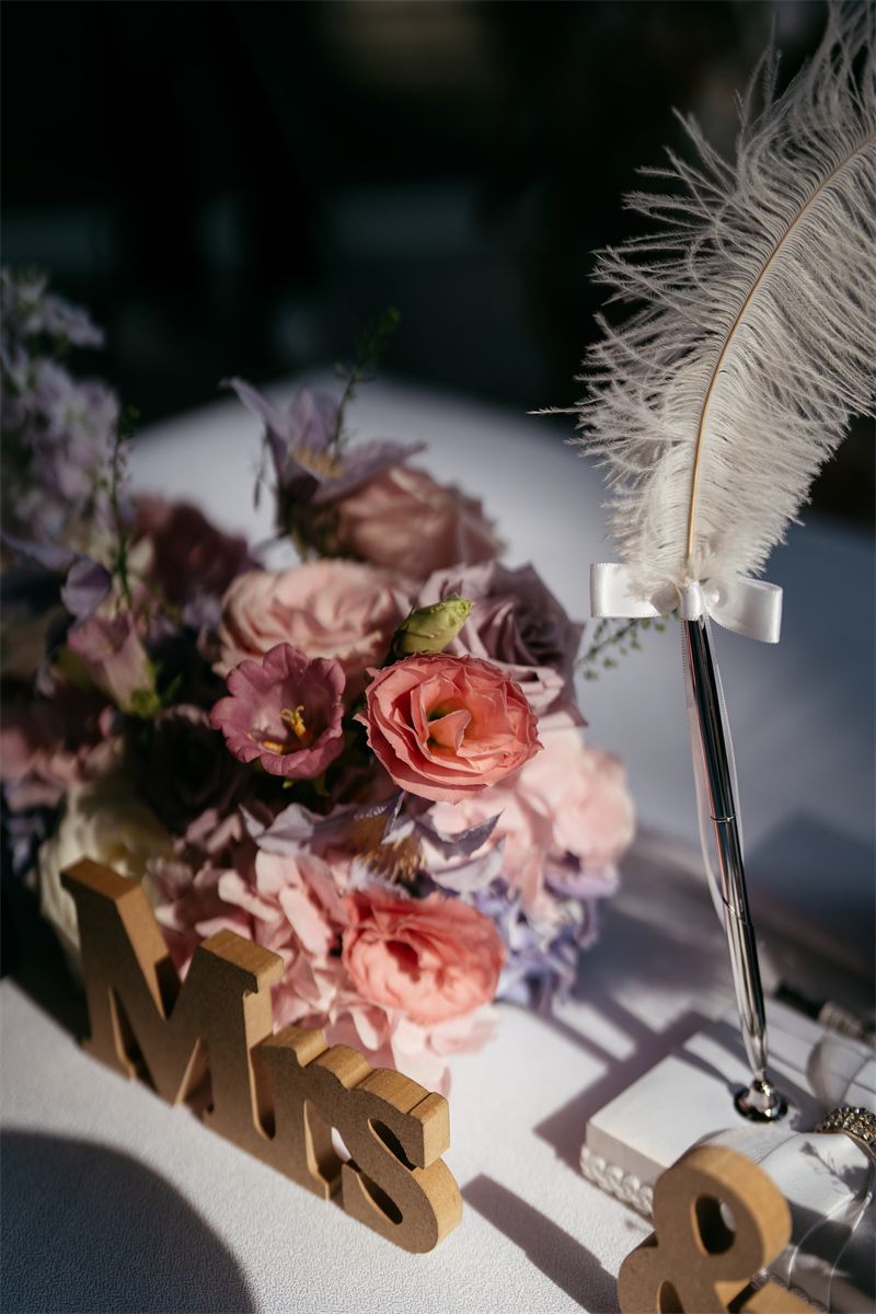 Mrs sign with roses and a feather pen