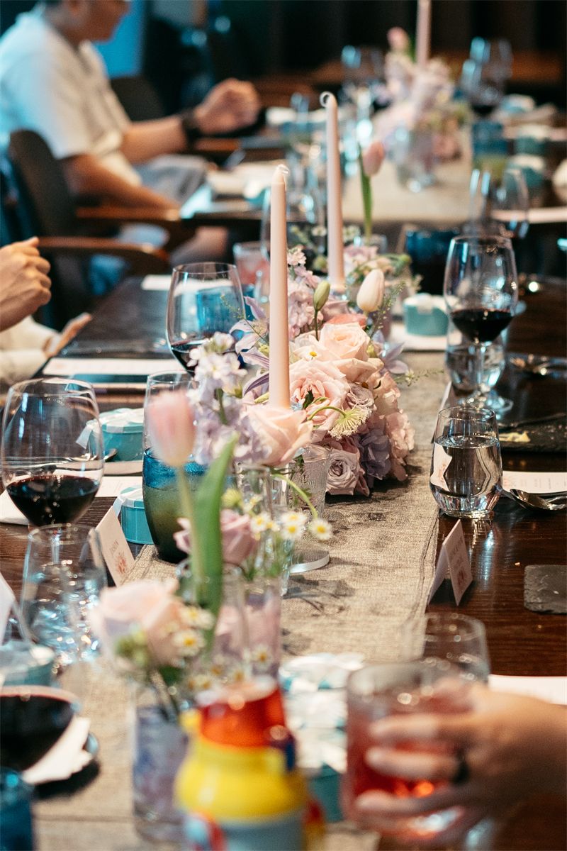 Dinner table with flowers and glasses